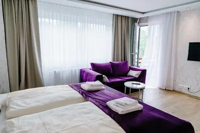 Ein Bett oder Betten in einem Zimmer der Unterkunft Haus am See HS 233