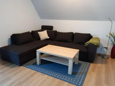 Ein Sitzbereich in der Unterkunft Ferienwohnungen Steeg