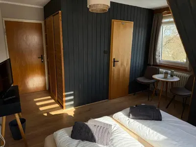 Ein Bett oder Betten in einem Zimmer der Unterkunft Hotel Zur Erholung