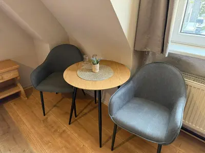 Ein Sitzbereich in der Unterkunft Hotel Zur Erholung