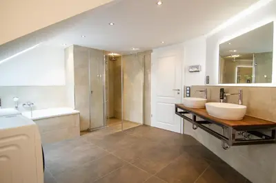 Ein Badezimmer in der Unterkunft Schiefer Suite Hotel & Apartments