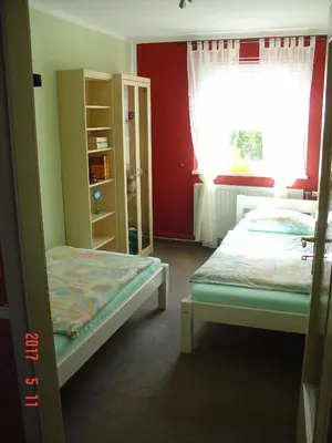 Ein Bett oder Betten in einem Zimmer der Unterkunft Am Märchenturm