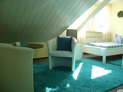 Ein Sitzbereich in der Unterkunft Am Märchenturm