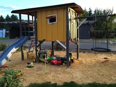 Ein Kinderspielbereich in der Unterkunft Ferienhaus Katja