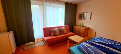 Ein Bett oder Betten in einem Zimmer der Unterkunft Hotel garni Am Hochwald