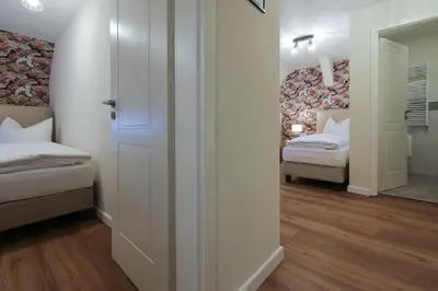 Ein Bett oder Betten in einem Zimmer der Unterkunft Altstadthotel Zur Börse