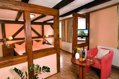 Ein Bett oder Betten in einem Zimmer der Unterkunft Hotel Zum Kanzler