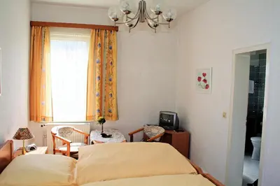 Ein Bett oder Betten in einem Zimmer der Unterkunft Hotel Fernblick
