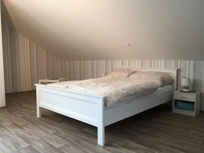 Ein Bett oder Betten in einem Zimmer der Unterkunft Fewo Granetalsperre