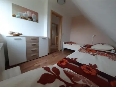Ein Bett oder Betten in einem Zimmer der Unterkunft Ferienhaus Natzel