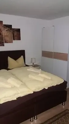 Ein Bett oder Betten in einem Zimmer der Unterkunft Pension Cecilie