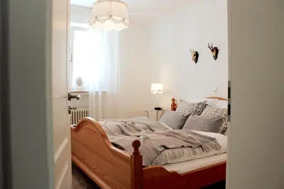 Ein Bett oder Betten in einem Zimmer der Unterkunft Ferienhaus Am Stadtpark