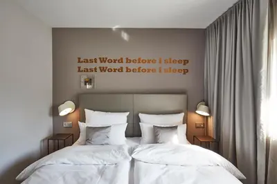 Ein Bett oder Betten in einem Zimmer der Unterkunft LIONO BoutiqueHotel