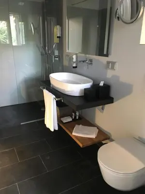 Ein Badezimmer in der Unterkunft LIONO BoutiqueHotel