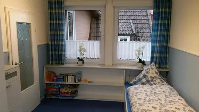 Ein Bett oder Betten in einem Zimmer der Unterkunft Haus Isabelle OG