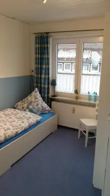 Ein Bett oder Betten in einem Zimmer der Unterkunft Haus Isabelle OG