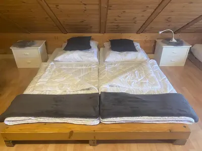 Ein Bett oder Betten in einem Zimmer der Unterkunft Fischer Hütte