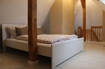 Ein Bett oder Betten in einem Zimmer der Unterkunft Ferienwohnung Paula