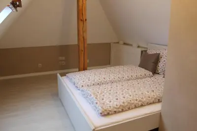 Ein Bett oder Betten in einem Zimmer der Unterkunft Ferienwohnung Paula