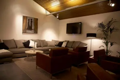 Ein Sitzbereich in der Unterkunft Hotel Njord