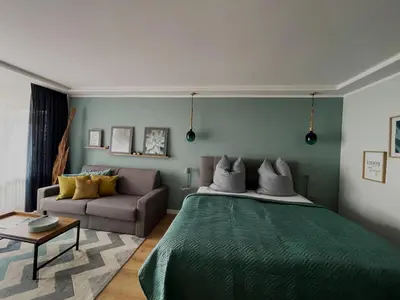 Ein Bett oder Betten in einem Zimmer der Unterkunft Haus Vier Jahreszeiten am See Vier Jahreszeiten - HS 221