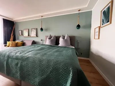 Ein Bett oder Betten in einem Zimmer der Unterkunft Haus Vier Jahreszeiten am See Vier Jahreszeiten - HS 221