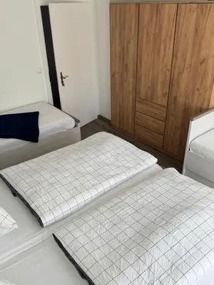 Ein Bett oder Betten in einem Zimmer der Unterkunft Ferienwohnung Manja