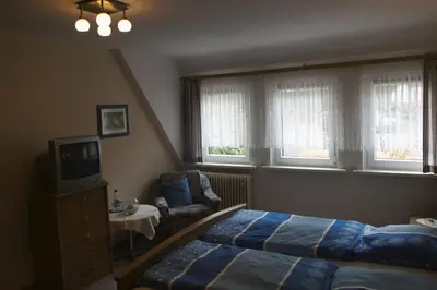 Ein Bett oder Betten in einem Zimmer der Unterkunft Pension Volkert