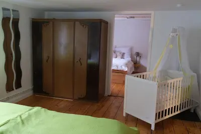 Ein Bett oder Betten in einem Zimmer der Unterkunft Ursprüngliches Harzhaus für Aktive in Clausthal