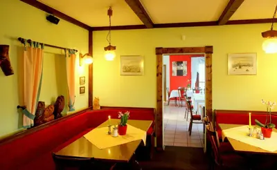 Ein Restaurant oder anderes Speiselokal in der Unterkunft Hotel Brockenstübchen