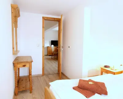 Ein Bett oder Betten in einem Zimmer der Unterkunft Hotel Brockenstübchen