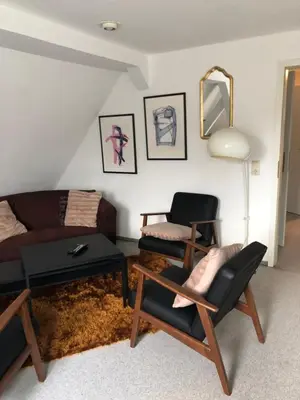Ein Sitzbereich in der Unterkunft Ferienwohnung Harzsterne