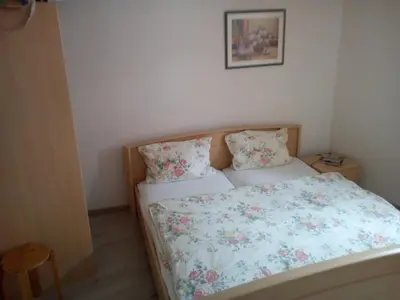 Ein Bett oder Betten in einem Zimmer der Unterkunft Alter Topf