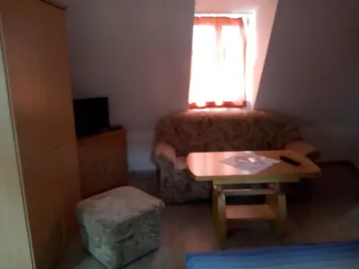 Ein Sitzbereich in der Unterkunft Alter Topf