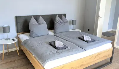 Ein Bett oder Betten in einem Zimmer der Unterkunft Goethes liebste Betten - stilvolle Ferienwohnungen im historischen Fachwerkhaus in Wernigerode - Parkplatz, Smart-TV, W-Lan