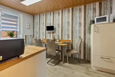 TV/Unterhaltungsangebot in der Unterkunft Christels Ferienwohnung 2 in Thale mit überdachter Terrasse, Küche mit TV & Geschirrspüler