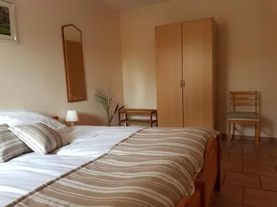 Ein Bett oder Betten in einem Zimmer der Unterkunft FeWo am Moorteich