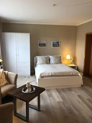 Ein Bett oder Betten in einem Zimmer der Unterkunft Ferienwohnung Kraft