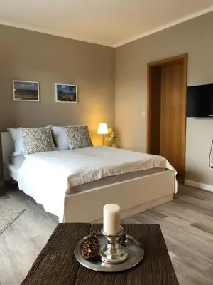 Ein Bett oder Betten in einem Zimmer der Unterkunft Ferienwohnung Kraft