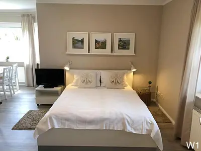 Ein Bett oder Betten in einem Zimmer der Unterkunft Ferienwohnung Kraft