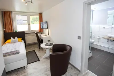 Ein Badezimmer in der Unterkunft Hotel Brunnenbach