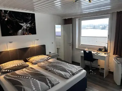 Ein Bett oder Betten in einem Zimmer der Unterkunft Hotel Brunnenbach