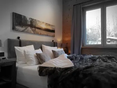 Ein Bett oder Betten in einem Zimmer der Unterkunft WLodgeOne