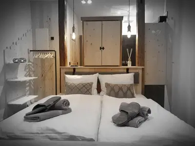 Ein Bett oder Betten in einem Zimmer der Unterkunft WLodgeOne