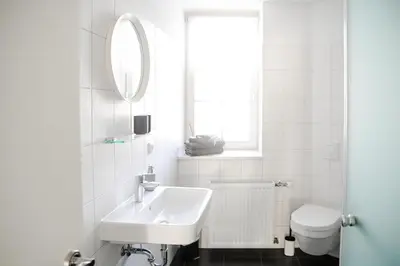 Ein Badezimmer in der Unterkunft FachwerQ'sleep Apartments adults only