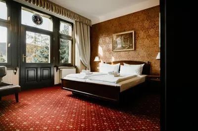 Ein Bett oder Betten in einem Zimmer der Unterkunft Schlosshotel Stecklenberg