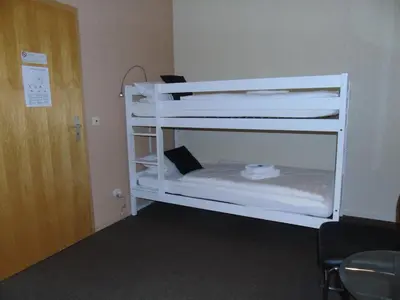 Ein Bett oder Betten in einem Zimmer der Unterkunft Landhaus Irmgard