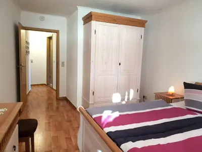 Ein Bett oder Betten in einem Zimmer der Unterkunft Ferienwohnung 
