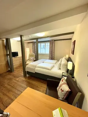 Ein Bett oder Betten in einem Zimmer der Unterkunft GDA Hotel Schwiecheldthaus