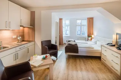 Ein Bett oder Betten in einem Zimmer der Unterkunft GDA Hotel Schwiecheldthaus